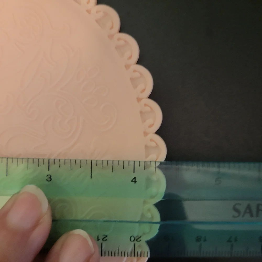 Pink plastic fantasy hand mirror